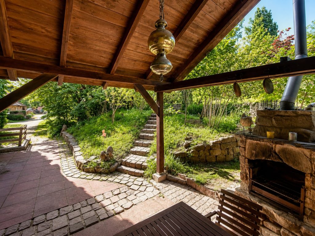 Ferienwohnung Melkerstübchen – Außen Zugang Garten