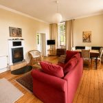 Ferienwohnung Ostwind – Wohnzimmer Kamin